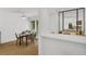 Dining room features hardwood floors, a dining table, and view to the kitchen area at 1997 N Landing Way, Marietta, GA 30066