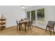 Dining room featuring hardwood floors, a dining table, and natural light from windows at 1997 N Landing Way, Marietta, GA 30066