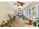 Sunroom converted to exercise room featuring tile floor and nature views at 1997 N Landing Way, Marietta, GA 30066
