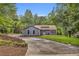 Charming single-story home with a well-manicured front yard and a welcoming driveway at 1997 N Landing Way, Marietta, GA 30066