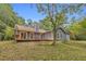 Exterior view of home with deck, windows, and backyard at 1997 N Landing Way, Marietta, GA 30066