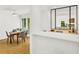 Open kitchen and dining room area with a breakfast bar and lots of natural light at 1997 N Landing Way, Marietta, GA 30066