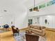 Open-concept living room with high ceilings, lots of natural light, and a view into the dining room at 1997 N Landing Way, Marietta, GA 30066