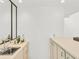 Compact wet bar area featuring a sink, counter space, and storage cabinets at 1997 N Landing Way, Marietta, GA 30066