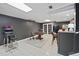 Finished basement with tile flooring, gray walls, and gameroom with pinball machine at 5028 Winding Hills Ln, Woodstock, GA 30189