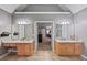 Dual vanities in the bathroom offer granite counters and wood cabinets at 5028 Winding Hills Ln, Woodstock, GA 30189