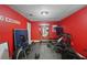 A workout room with various fitness equipment, and motivational decor at 5028 Winding Hills Ln, Woodstock, GA 30189