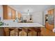 Charming kitchen with a large island, barstool seating, and stainless steel appliances at 5028 Winding Hills Ln, Woodstock, GA 30189