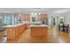 Expansive kitchen featuring an island with seating and modern appliances, perfect for entertaining at 5028 Winding Hills Ln, Woodstock, GA 30189