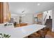 Open kitchen with a large center island, seating, and hardwood flooring at 5028 Winding Hills Ln, Woodstock, GA 30189
