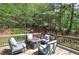 Back deck seating area with outdoor furniture and a scenic view at 527 Cass White Nw Rd, Cartersville, GA 30121