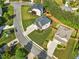 Aerial shot of a residential property showcasing its expansive lawn, landscaping, and neighborhood at 1925 Piedmont Cove Ln, Cumming, GA 30040