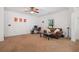 Cozy living room with a comfortable sofa, desk space, and natural light at 1925 Piedmont Cove Ln, Cumming, GA 30040