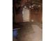 Damaged basement featuring exposed insulation and materials scattered across the floor at 2021 Moody Drive Southwest, Atlanta, GA 30315