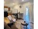 Open concept living area with modern finishes and plenty of natural light at 2021 Moody Drive Southwest, Atlanta, GA 30315