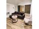 Cozy living area featuring comfortable seating and stylish decor, illuminated by natural light at 2021 Moody Drive Southwest, Atlanta, GA 30315