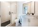Modern bathroom featuring a glass-enclosed shower, sleek vanity, and stylish fixtures at 417 E College Ave # 102, Decatur, GA 30030