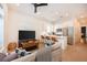 Modern living space with open kitchen, offering bar seating and stylish living area at 417 E College Ave # 102, Decatur, GA 30030