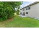 Backyard with a patio area, perfect for outdoor entertaining and relaxation at 5281 Tormeall Trce, Suwanee, GA 30024