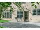 Backyard patio featuring ample seating, a private backyard, and convenient access to the home's back door at 5281 Tormeall Trce, Suwanee, GA 30024