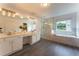 Modern bathroom featuring a double vanity, large soaking tub, and seamless glass shower, plus neutral colors at 5281 Tormeall Trce, Suwanee, GA 30024