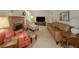 Inviting living room with a brick fireplace and comfortable seating arrangement at 664 Mcburnette Ne Rd, Marietta, GA 30068