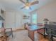 Bright home office with a large desk, comfortable seating, and natural light at 664 Mcburnette Ne Rd, Marietta, GA 30068