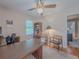 Functional home office with a large desk, storage shelves, and natural lighting at 664 Mcburnette Ne Rd, Marietta, GA 30068