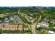 Aerial view of residential community featuring mature trees, winding streets, and diverse housing options at 991 Sibley Ne Ln, Atlanta, GA 30324