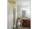 Cozy bathroom featuring a toilet, shower, curtain, and vanity with granite countertop at 991 Sibley Ne Ln, Atlanta, GA 30324