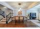 Elegant dining room featuring hardwood floors and views into the living room at 991 Sibley Ne Ln, Atlanta, GA 30324