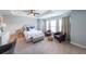 Bright bedroom with large windows, seating area, and decorative accents at 991 Sibley Ne Ln, Atlanta, GA 30324