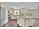 Elegant kitchen with an island, stainless steel appliances, and ample counter space for cooking at 115 Ocee View Ct, Alpharetta, GA 30022