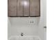 Functional laundry room featuring ample storage and modern appliances for convenience at 115 Ocee View Ct, Alpharetta, GA 30022