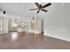 Open living room showcases a modern kitchen, hardwood floors, and spacious layout at 115 Ocee View Ct, Alpharetta, GA 30022