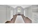 Custom walk-in closet with lots of storage, cabinets and natural light at 115 Ocee View Ct, Alpharetta, GA 30022