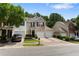 Charming townhome with a well-manicured lawn and an attached one car garage at 3313 Thornbridge Dr, Powder Springs, GA 30127