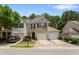 Charming townhome featuring a well-manicured lawn and a convenient one-car garage at 3313 Thornbridge Dr, Powder Springs, GA 30127