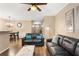 Open concept living room with a view into the dining area and entry hallway at 3313 Thornbridge Dr, Powder Springs, GA 30127
