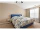 Main bedroom with neutral walls, large bed, and natural light from the windows at 3313 Thornbridge Dr, Powder Springs, GA 30127