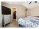 Main bedroom with dresser, large bed, closet, and vaulted ceiling at 3313 Thornbridge Dr, Powder Springs, GA 30127