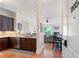 Modern kitchen with stainless steel appliances and granite countertops, open to the living area at 351 Washington Ne Ave # 205, Marietta, GA 30060