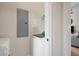 This laundry room features a modern white washer and dryer and neutral colored walls at 351 Washington Ne Ave # 205, Marietta, GA 30060