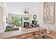 View of the living room with a balcony and fireplace from kitchen bar at 351 Washington Ne Ave # 205, Marietta, GA 30060