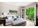 Inviting living room featuring balcony access with comfortable seating and natural light at 351 Washington Ne Ave # 205, Marietta, GA 30060