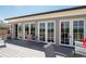 Outdoor patio area with seating and access to interior through french doors at 351 Washington Ne Ave # 205, Marietta, GA 30060