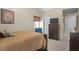 Serene bedroom with a dark wood dresser and bed providing an inviting and restful retreat at 3700 Mays Xing, Atlanta, GA 30331