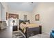 Comfortable bedroom featuring a wood-framed bed and neutral tones that creates a relaxing ambiance at 3700 Mays Xing, Atlanta, GA 30331
