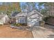 Well-maintained single-Gathering home with a charming facade, attached garage and mature landscaping in a tranquil neighborhood at 3700 Mays Xing, Atlanta, GA 30331