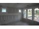 Unfinished bedroom with three windows and bare walls allowing customization and natural light at 4835 Beechnut Circle, Cumming, GA 30028